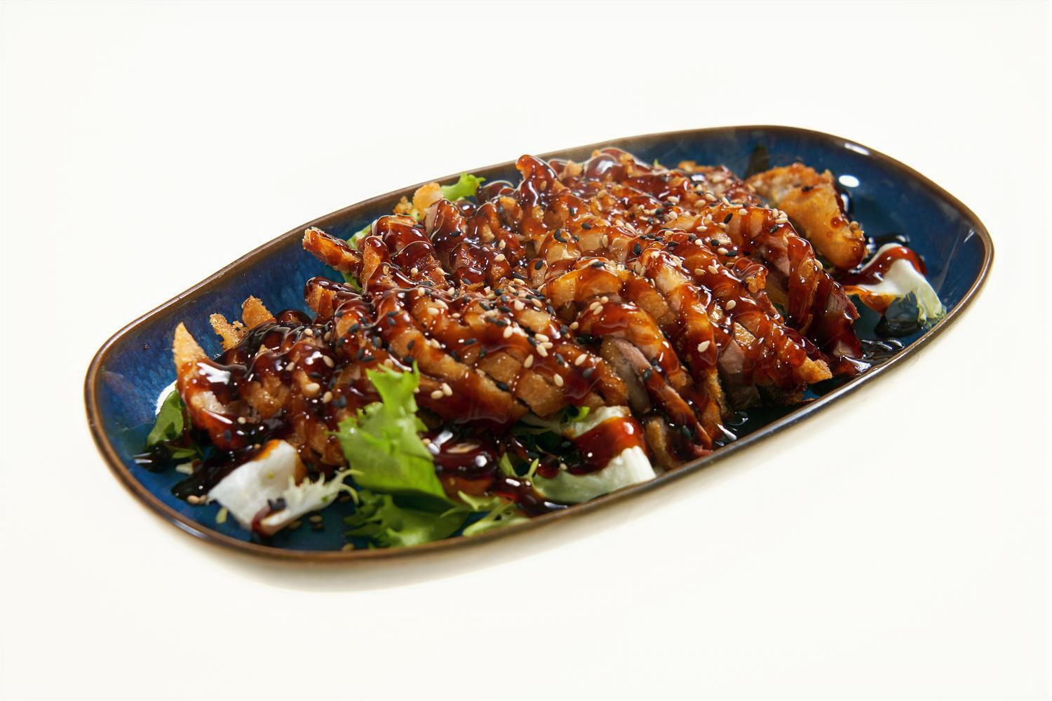 Pato asado con salsa teriyaki